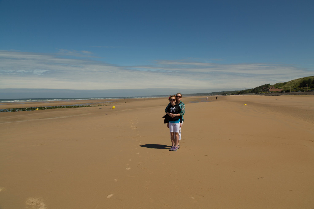 Syd and Kim on the beach at Saint-Laurent-sur-Mer.