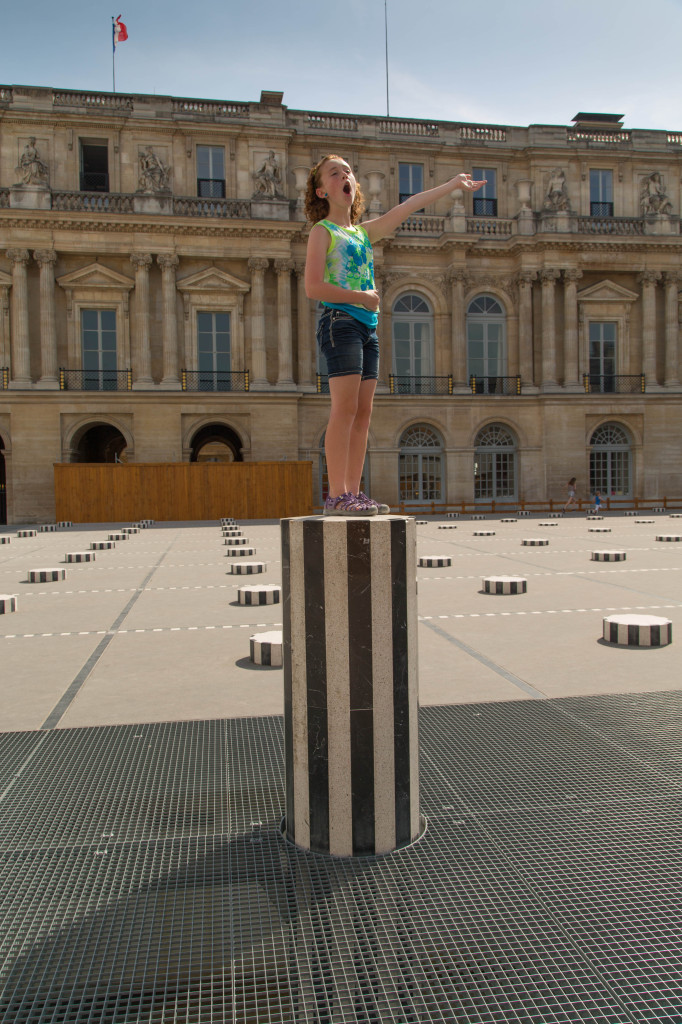 Sydney performing an old habit at Le Palais-Royal.